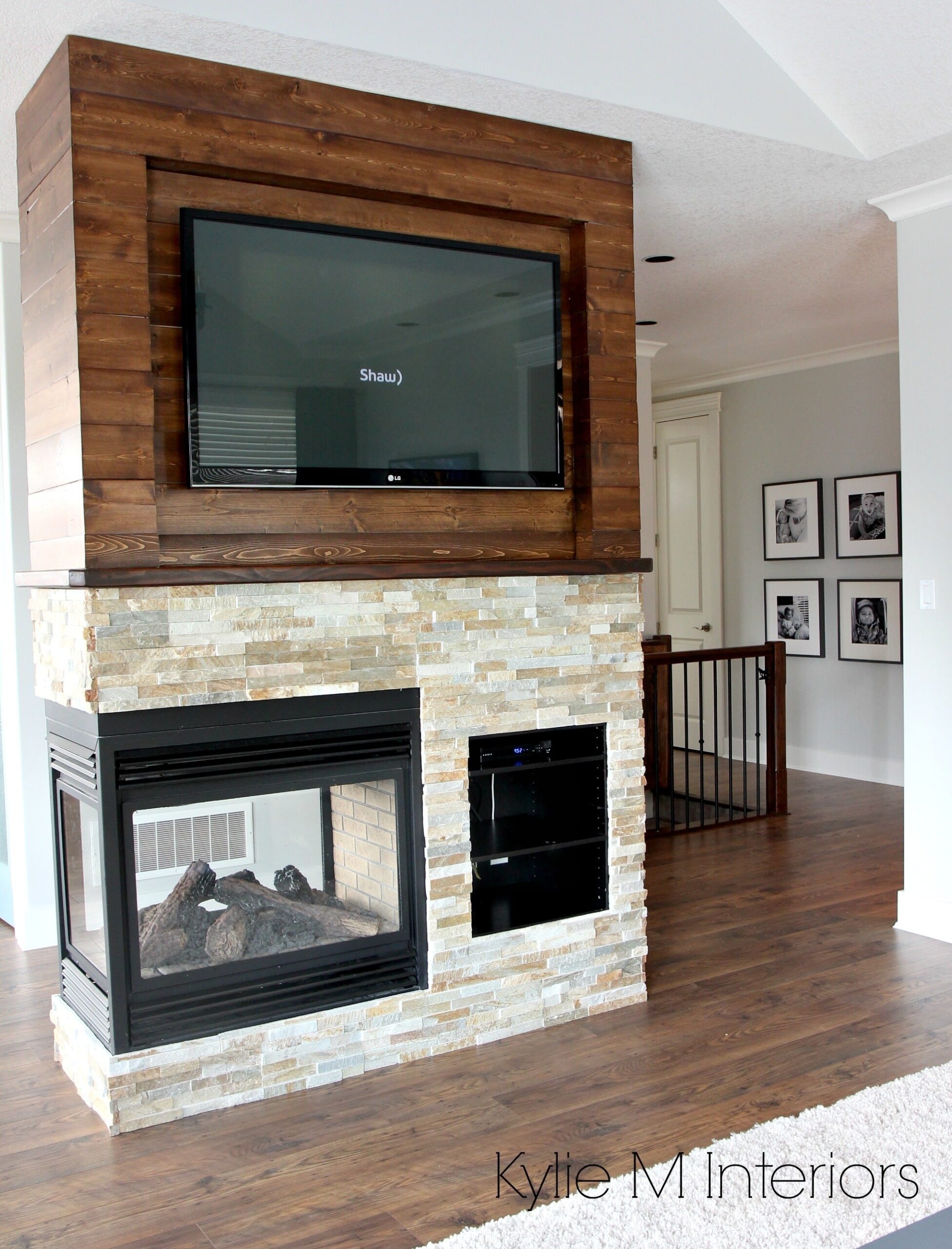 alluring stone ledgestone 3 sided fireplace with wood shiplap that is stained photos of tv mounted over fireplace image