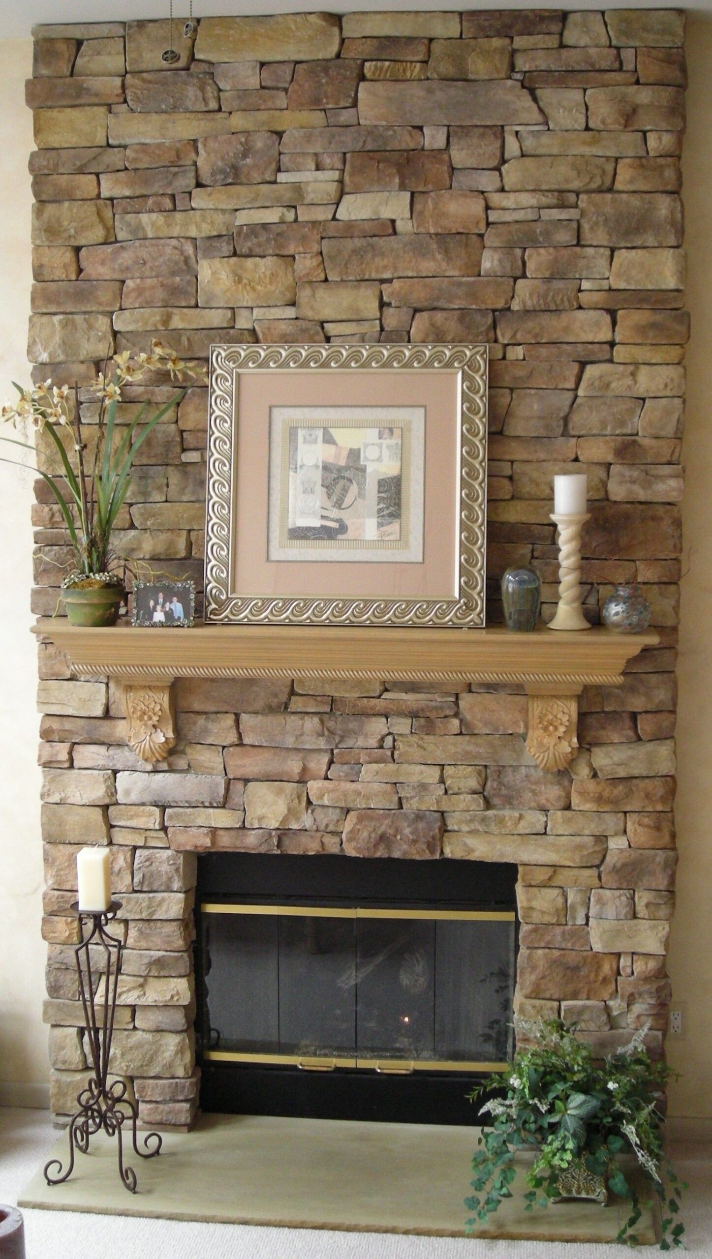 amazing they did a nice job of mixing in bigger stones without it being obvious faux stone around fireplace photo
