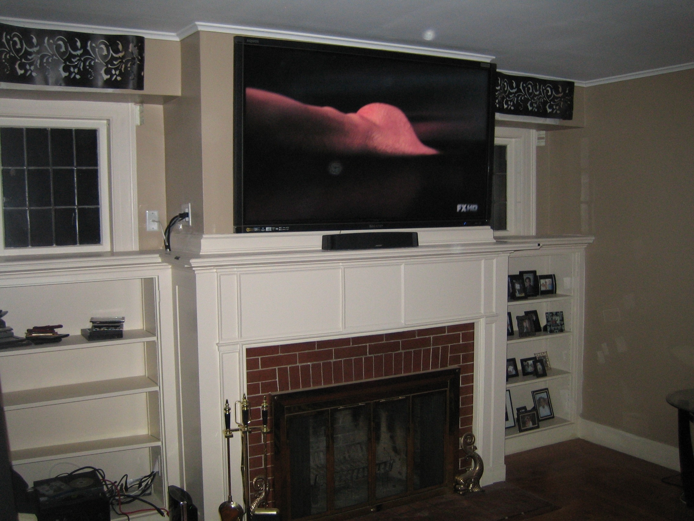 astonishing cheshire ct mount tv above fireplace | home theater installation flat screen tv on fireplace mantel image