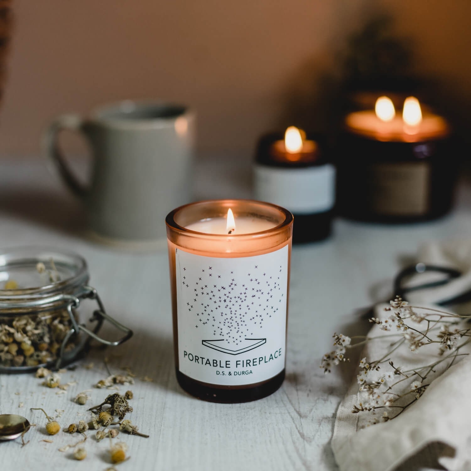 awesome d s &amp; durga portable fireplace scented candle | osmology candles that smell like a fireplace photo