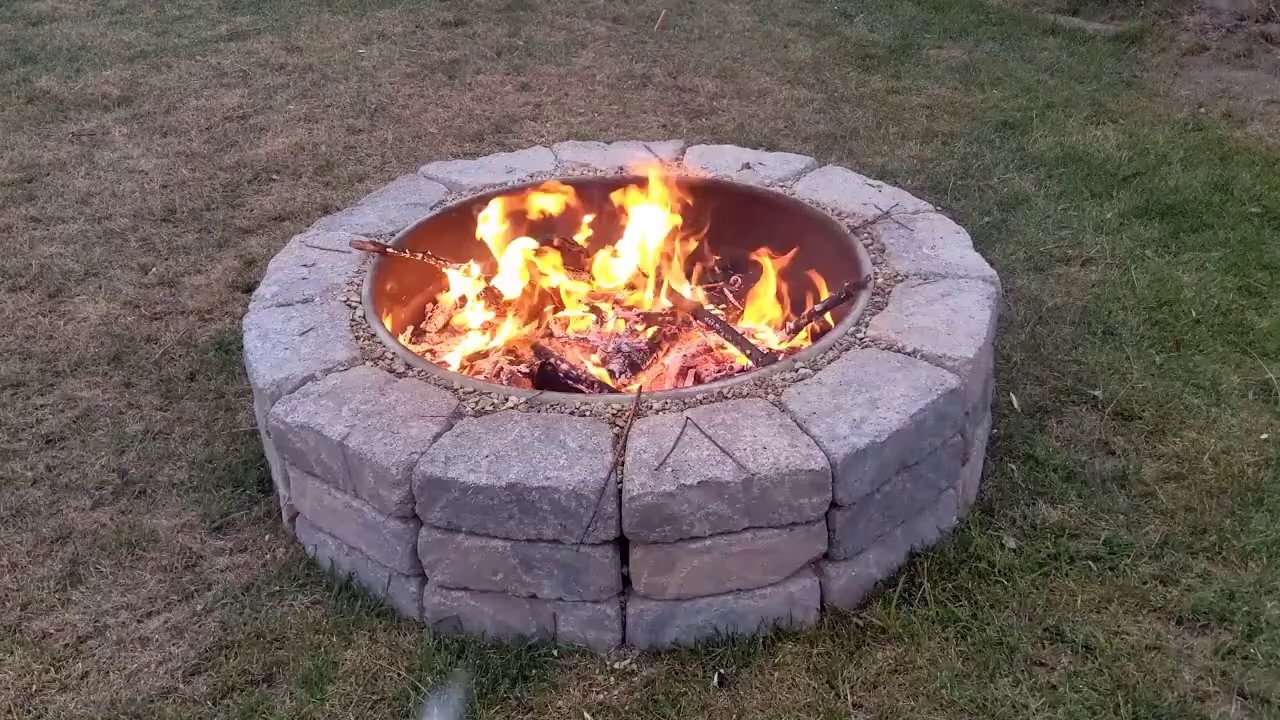 best how to build an easy backyard fire pit youtube how to build fire in fireplace image