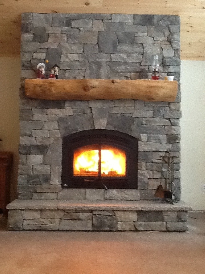 fantastic granite stone veneer fireplace in haliburton the cultured stoners how to use a real fireplace pics