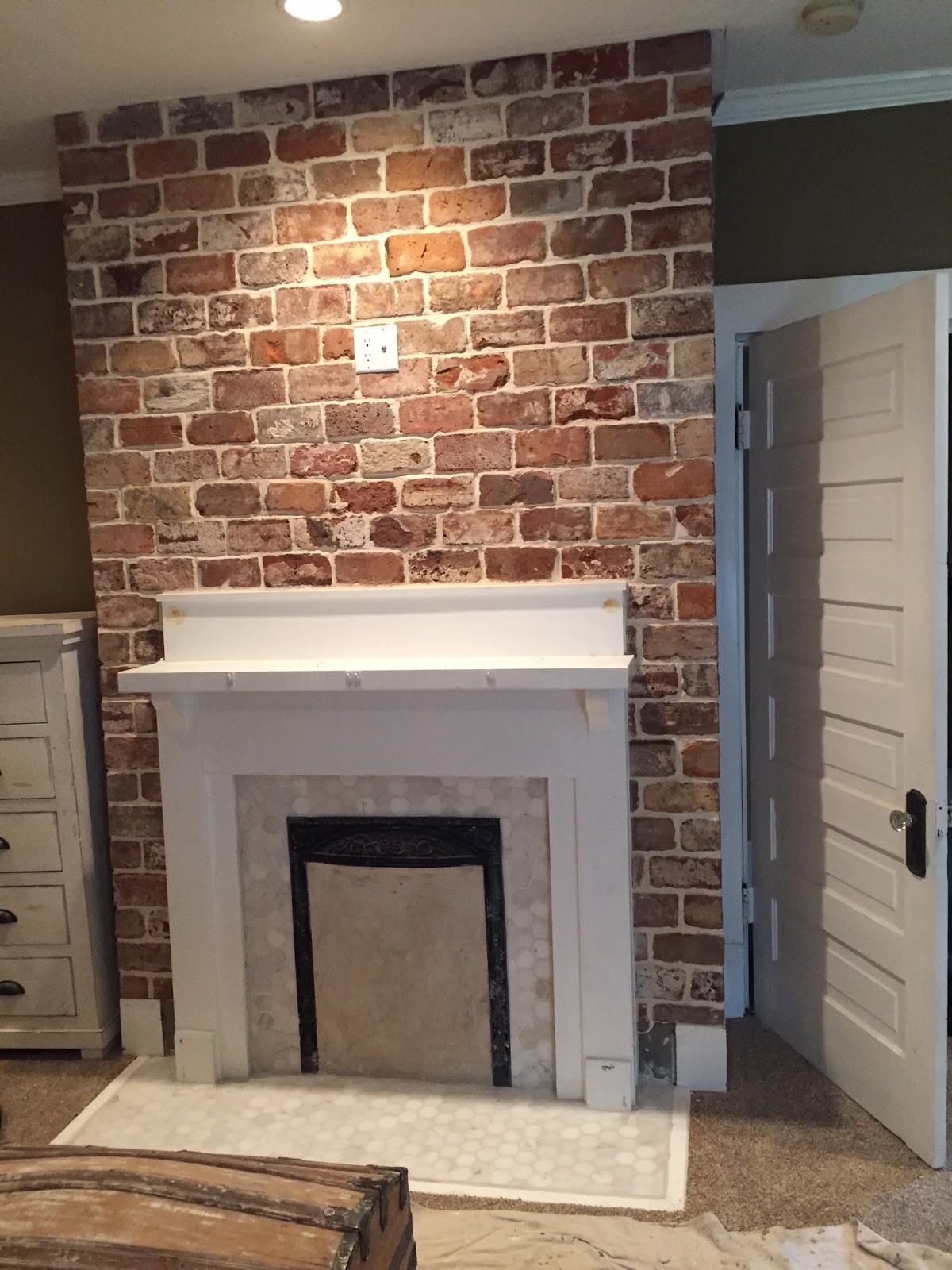 get lowes a vintage bricks fireplace installation / reclaimed brick tile blog how to hang a picture on a brick fireplace picture