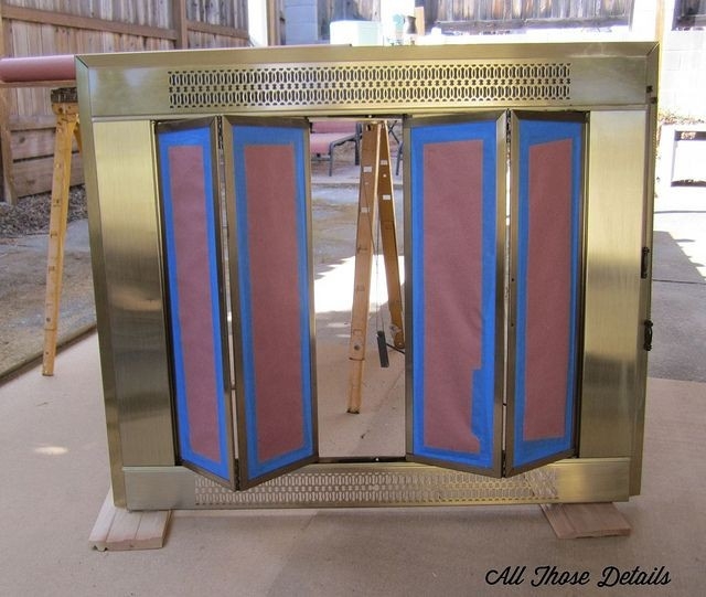 gorgeous frame preppedall those details, via flickr | fireplace doors, brass painting brass fireplace doors photo