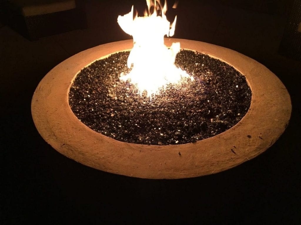 image of fire glass or ceramic logs for your fireplace? here's what you need to gas fireplace smells like gas image