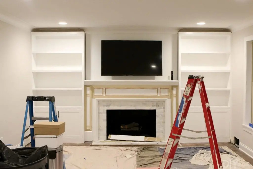 image of white built ins around the fireplace: before and after | the diy playbook diy built ins around fireplace picture