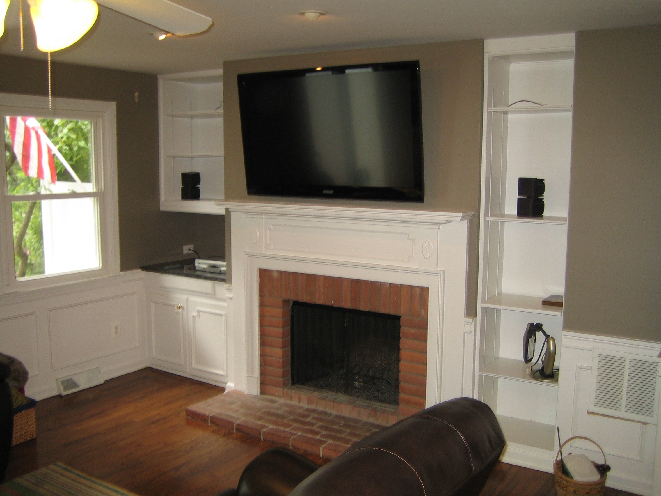 image of woodbridge ct mount tv above fireplace | home theater installation mounting a tv to a brick fireplace pics