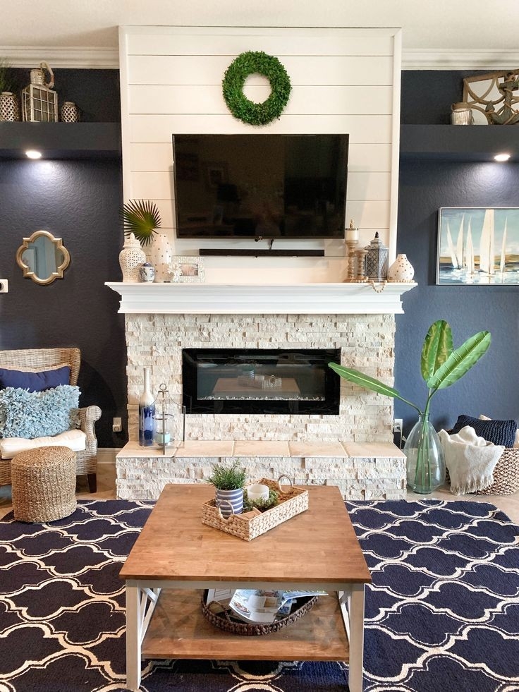 inspirational coastal living room with shiplap and stone fireplace | stone fireplace floor to ceiling fireplace makeover photo