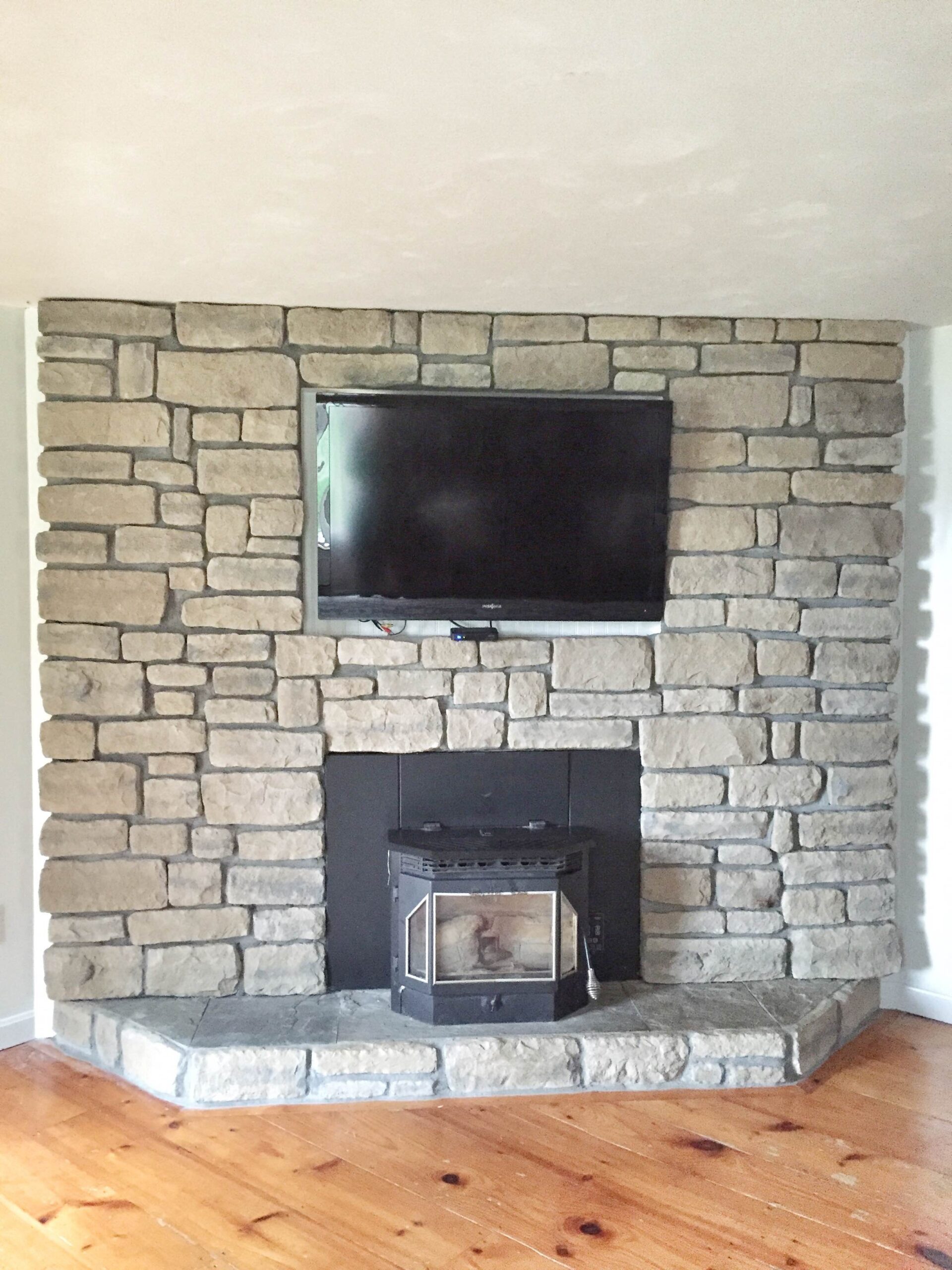 lowes our brick fireplace makeover refacing a brick fireplace with stone veneer pics