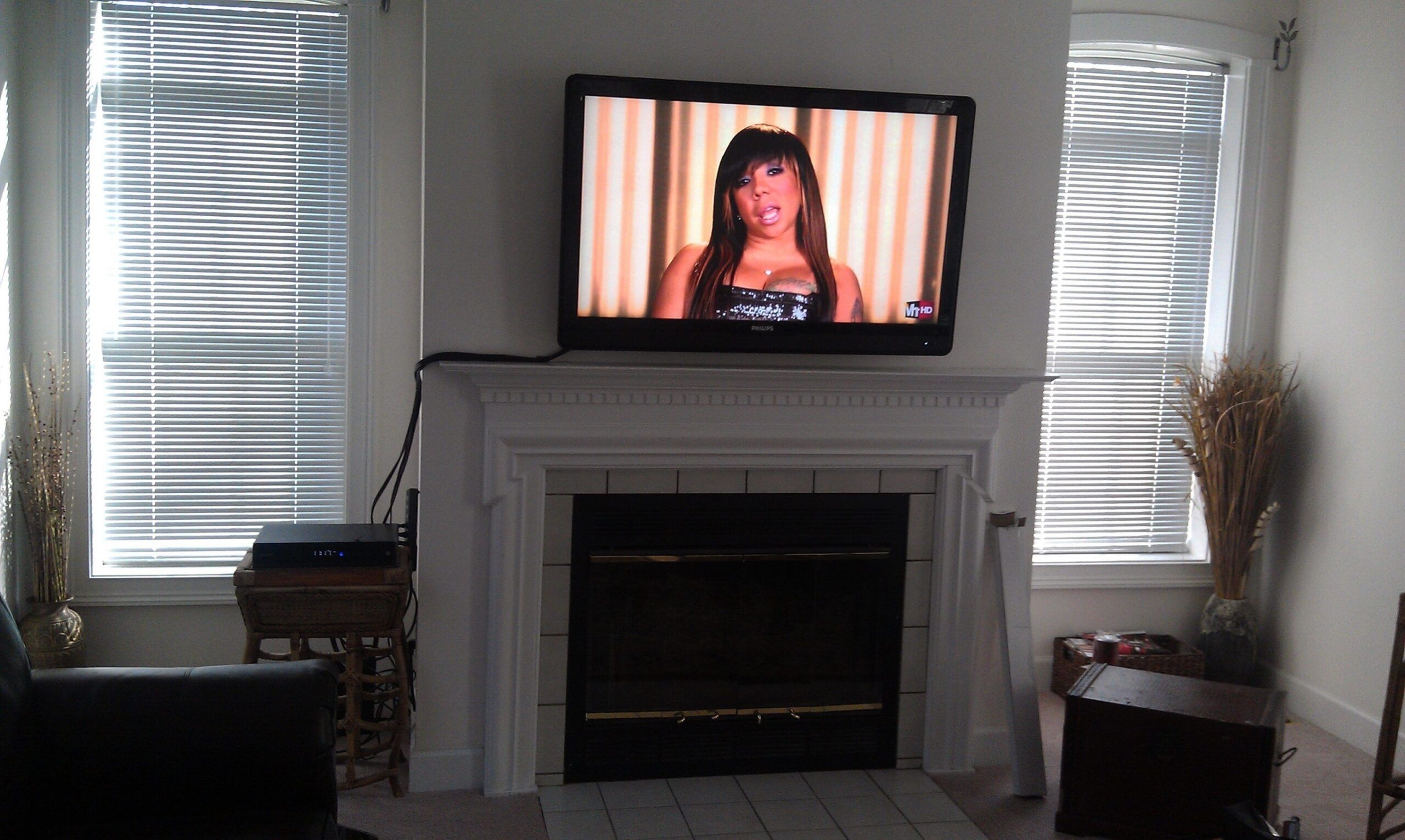 marvelous hanging tv above fireplace architecture | tv above fireplace, tv mounting tv over gas fireplace image
