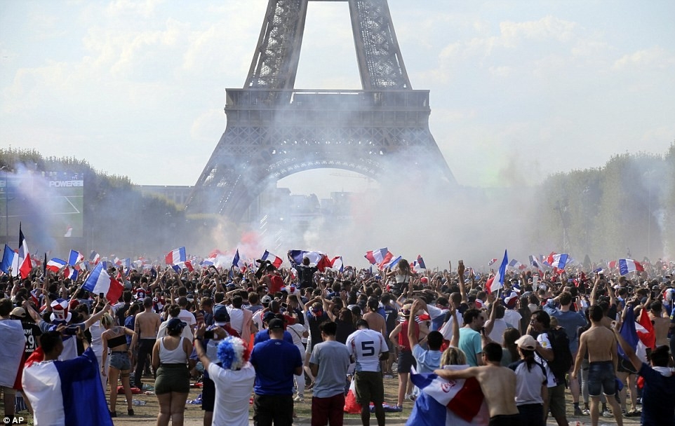 outstanding police fire tear gas after a million french celebrate world cup victory french word for fireplace photo
