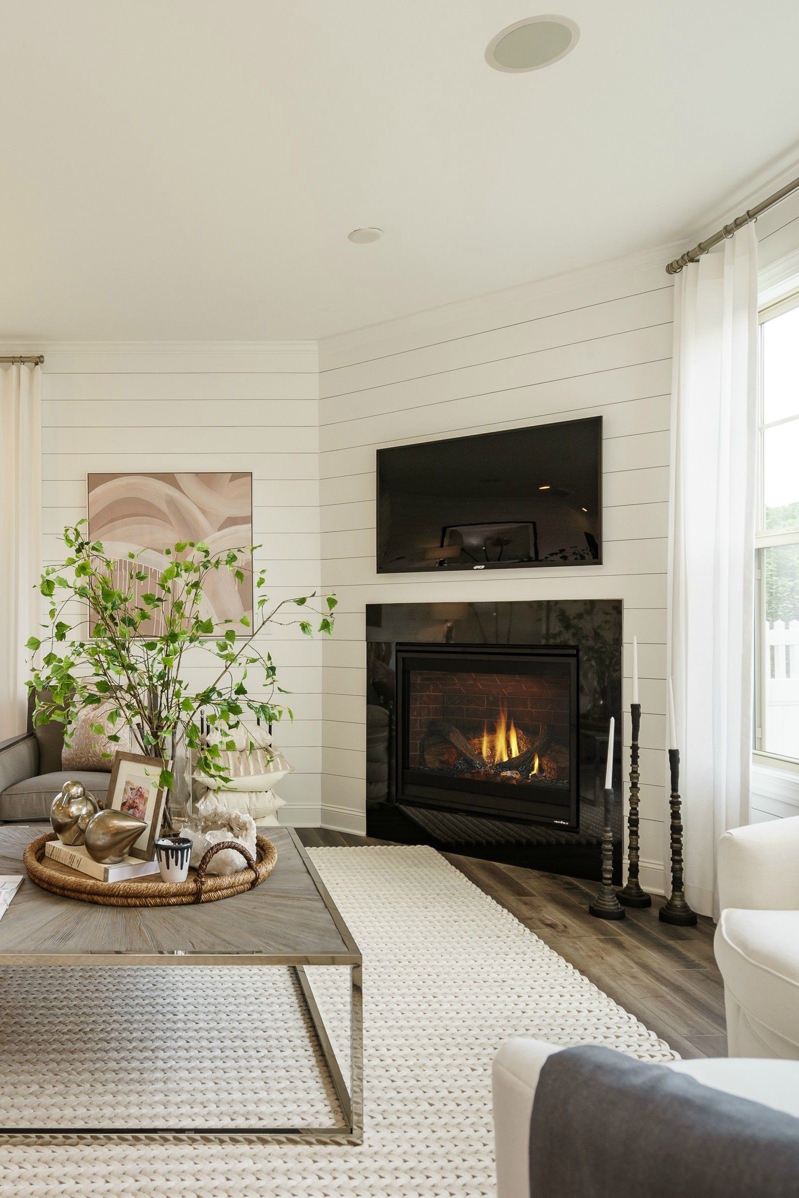 outstanding textural elements combined with crisp shiplap lend powerful, yet subtle gas fireplaces for small rooms photo
