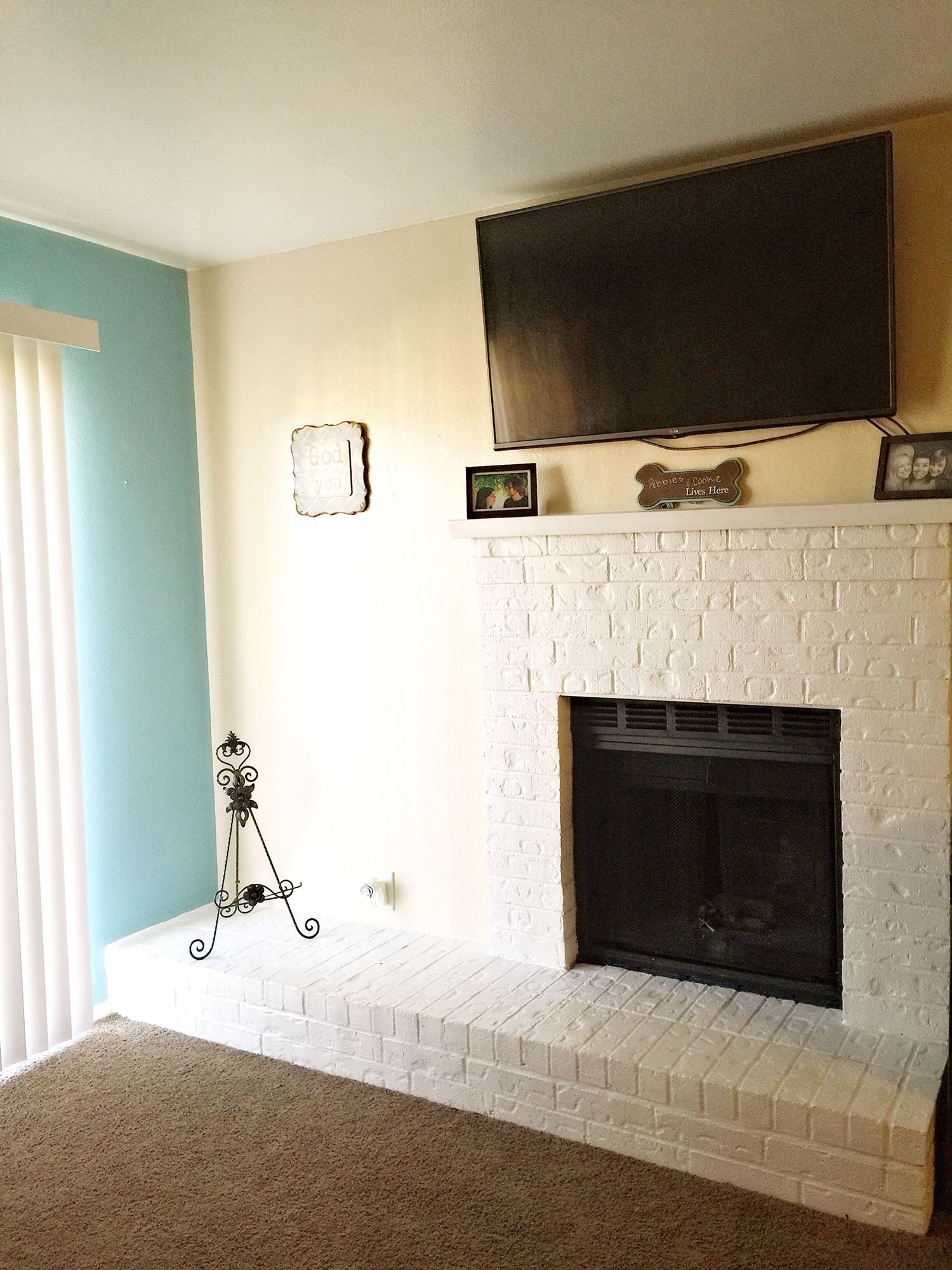 stunning mounted tv over white fireplace | white fireplace, fireplace, home photos of tv mounted over fireplace image