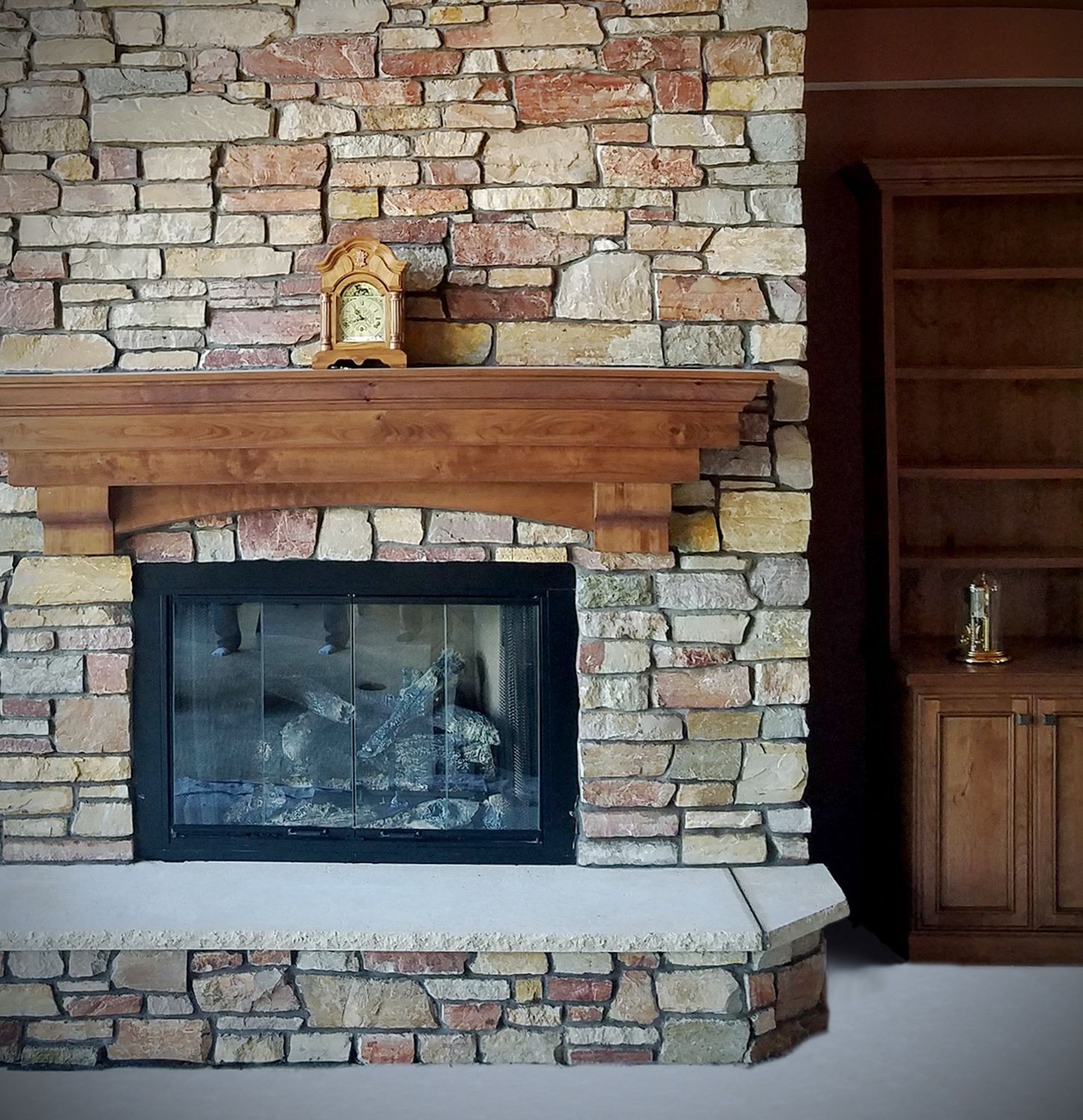 stylish outdoor patio, stacked stone veneer retaining wall &amp; natural stone stacked stone veneer fireplace surround image