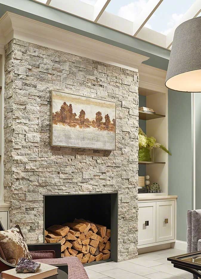 top living room scene | caramel travertine flooring | stacked stone stacked stone fireplace surround pics