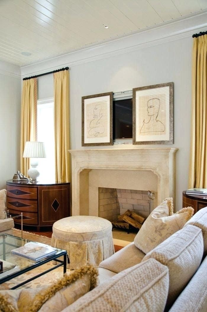 wonderful hide tv over fireplace how to above the framed paintings on sliding how to hide tv wires above fireplace image