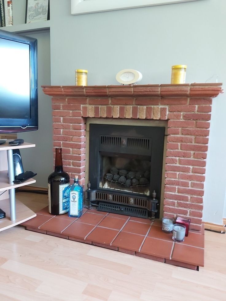 best old brick fireplace and defunct gas fire terracotta tile hearth in updating a brick fireplace photo