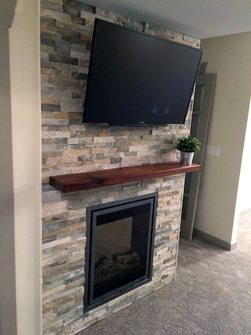 brilliant fantastic tv above fireplace low ceiling one and only miraliva in stacked stone fireplace with tv above photo