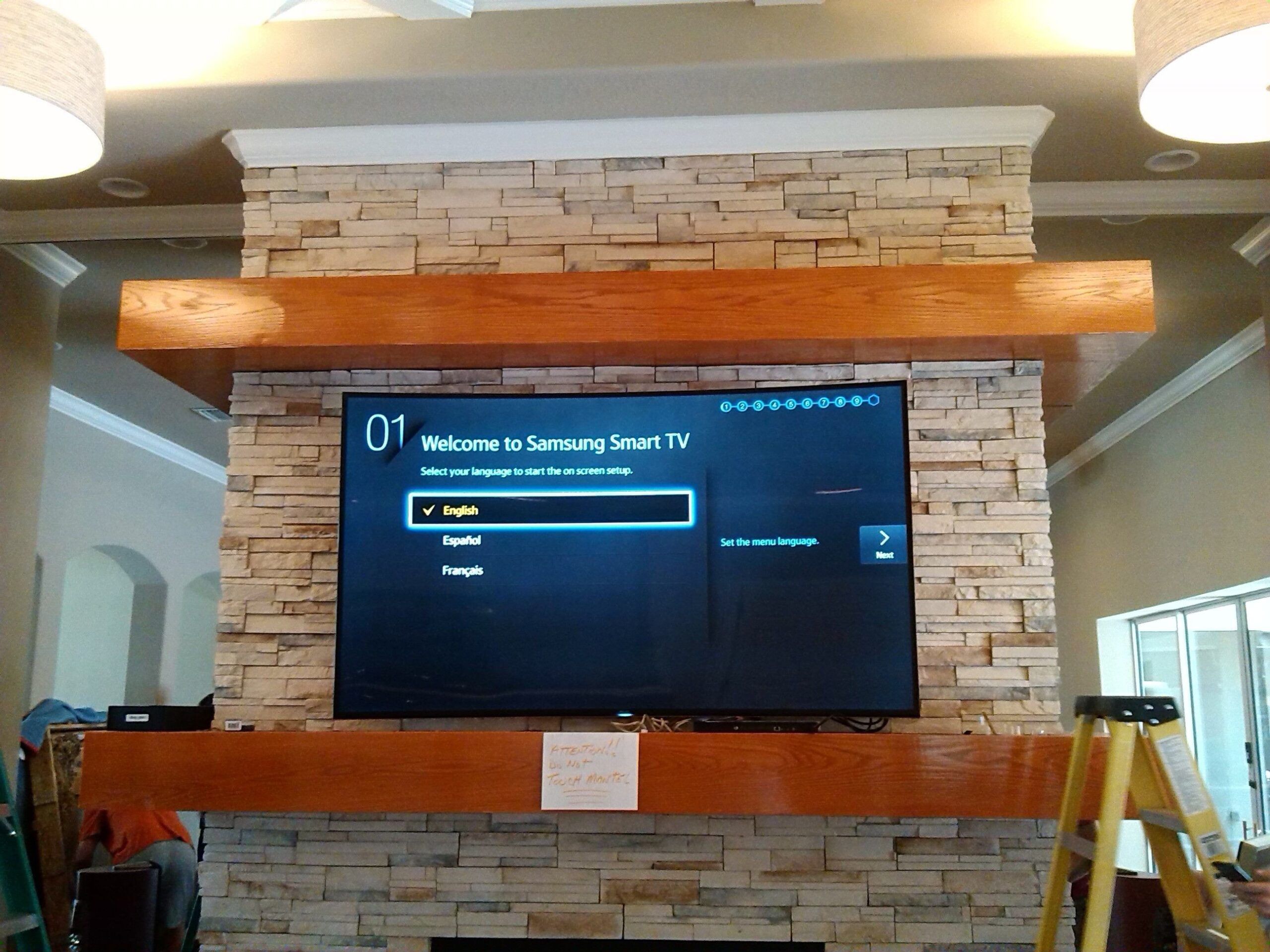 brilliant tv mounting over a stone fireplace (with images) | home theater mounting tv above fireplace hiding wires picture