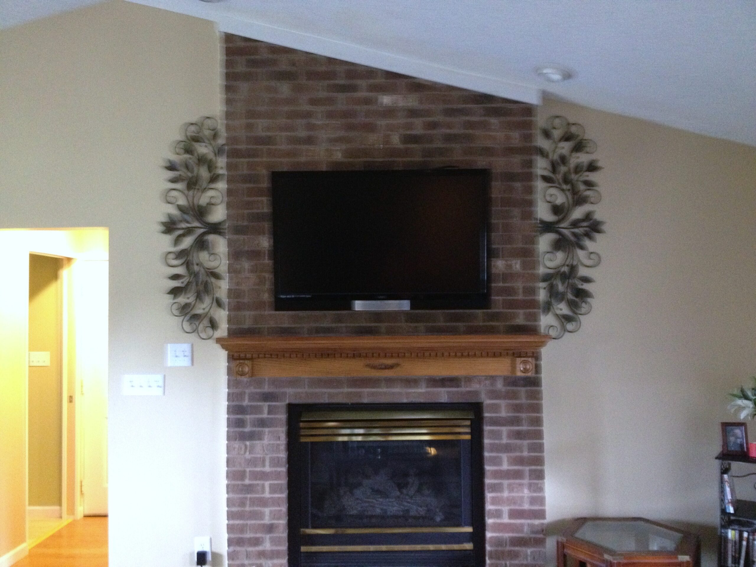 buy tv mounting over a fireplace with wires concealed in the wall tv above fireplace hiding wires photo