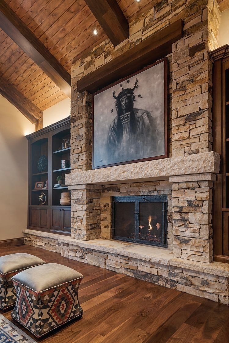 gorgeous love this! so dramatic would want large flat screen tv instead of stacked stone fireplace with tv above image