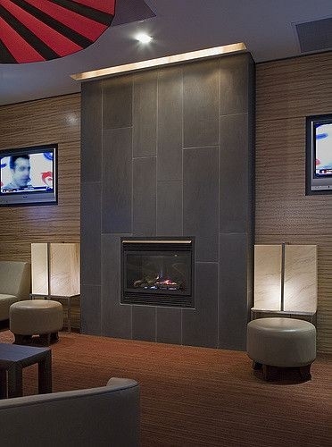 picture of cast concrete tiled fireplace in coal | fireplace tile surround fire resistant tiles fireplaces image