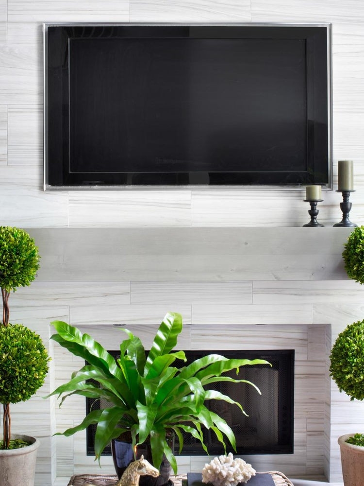 picture of installing a tv above the fireplace how high should a tv be mounted over a fireplace image