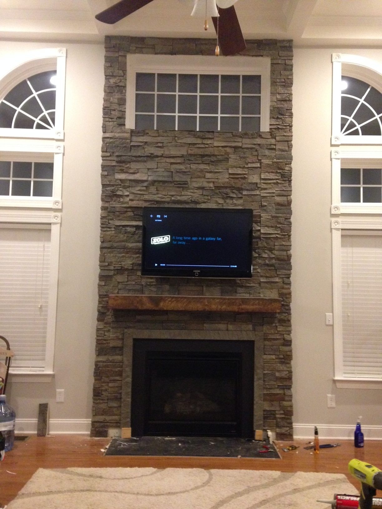 remarkable rocke's two story fireplace design | diy makeover | genstone full wall brick fireplace makeover photo