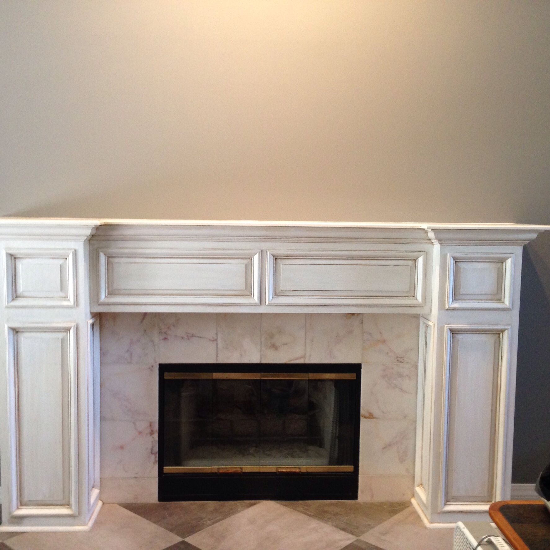stunning painted and aged &amp; antiqued fireplace seround! | interior paint paint for inside fireplace image