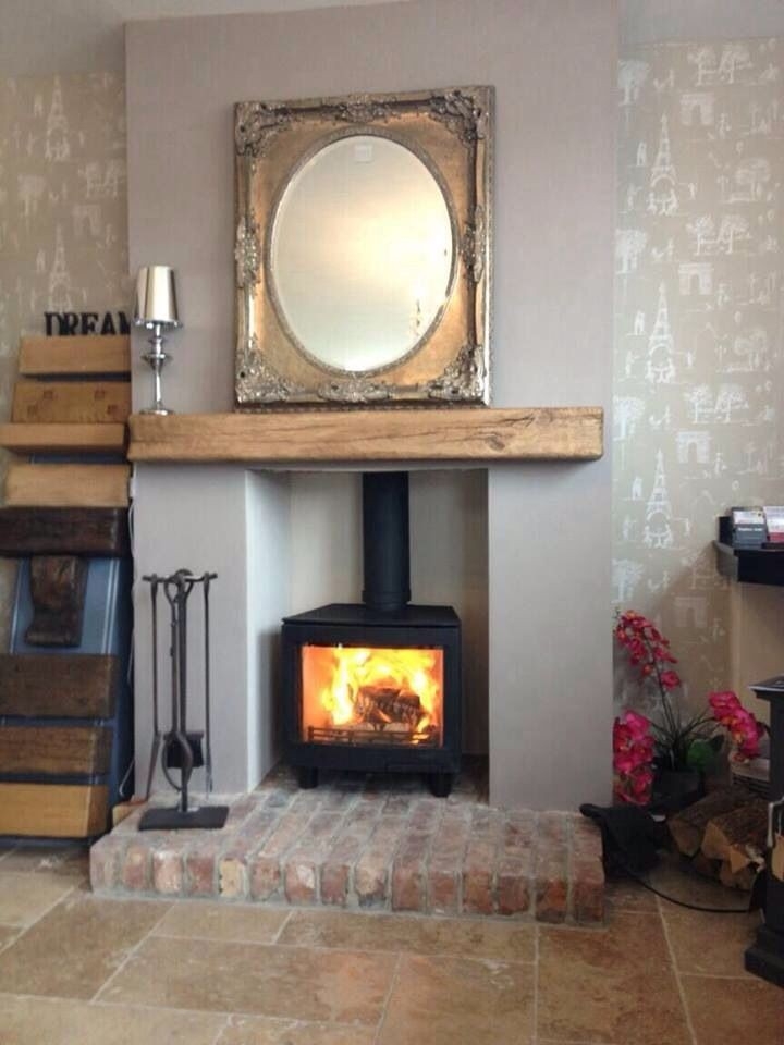 stunning pinlizzie hembree on hth living room | freestanding fireplace tv over fireplace heat shield pics