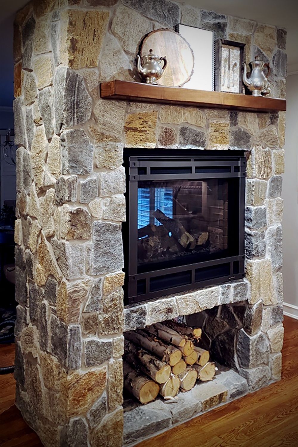 top fieldstone fireplace interior stone veneer craftsman wood mantel river stone fireplace surround photo