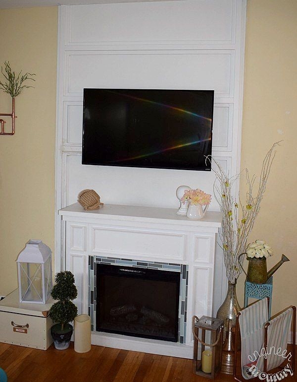 top how to hide those pesky tv cables | hide tv cords, tvs, tv above fireplace how to hide tv cables above fireplace image